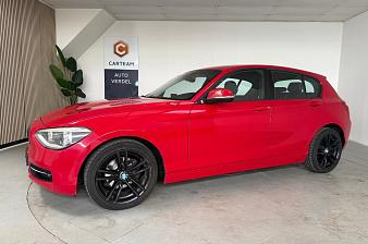 BMW 1 Serie 116i Upgrade Edition Airco, Navigatie, LMV, Lederen bekleding, 6 versnellingen.
