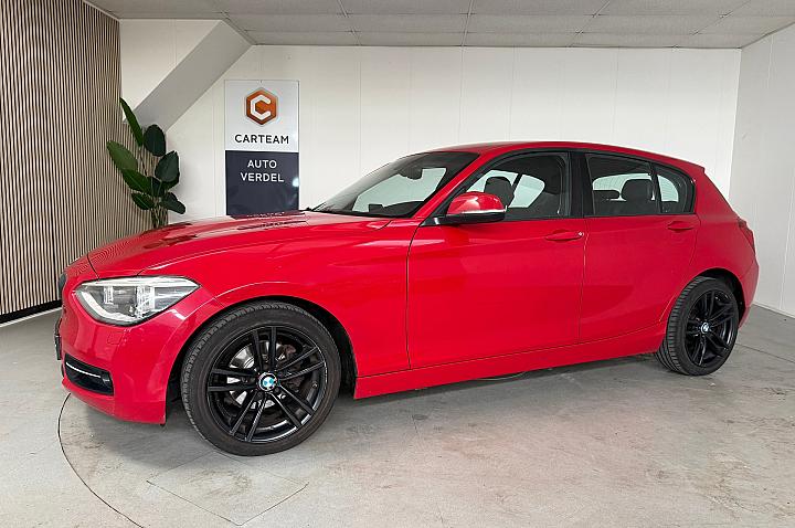 BMW 1 Serie 116i Upgrade Edition Airco, Navigatie, LMV, Lederen bekleding, 6 versnellingen.